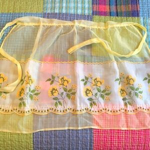 Vintage half apron. Yellow and green. Pockets. Totally useless, but very cute.